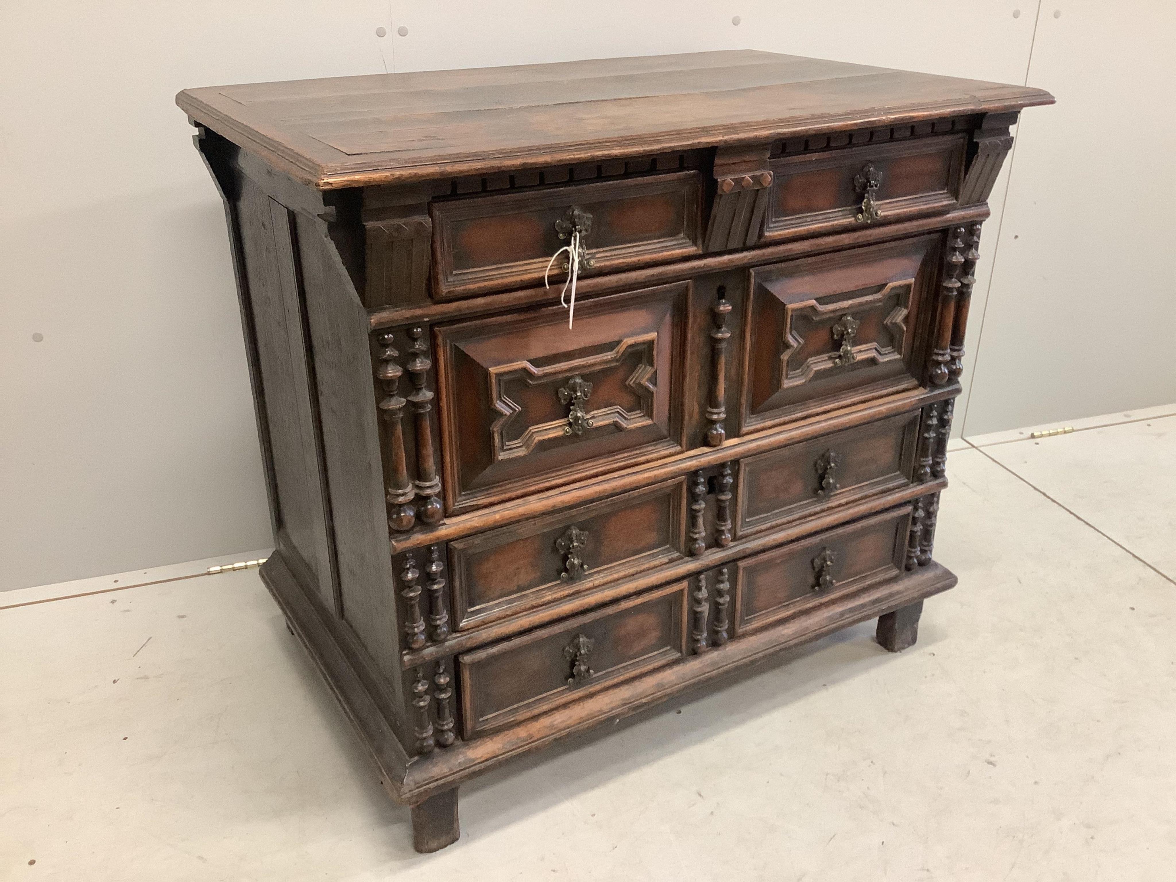 An 18th century oak block front chest of drawers, width 96cm, depth 61cm, height 85cm. Condition - fair to good